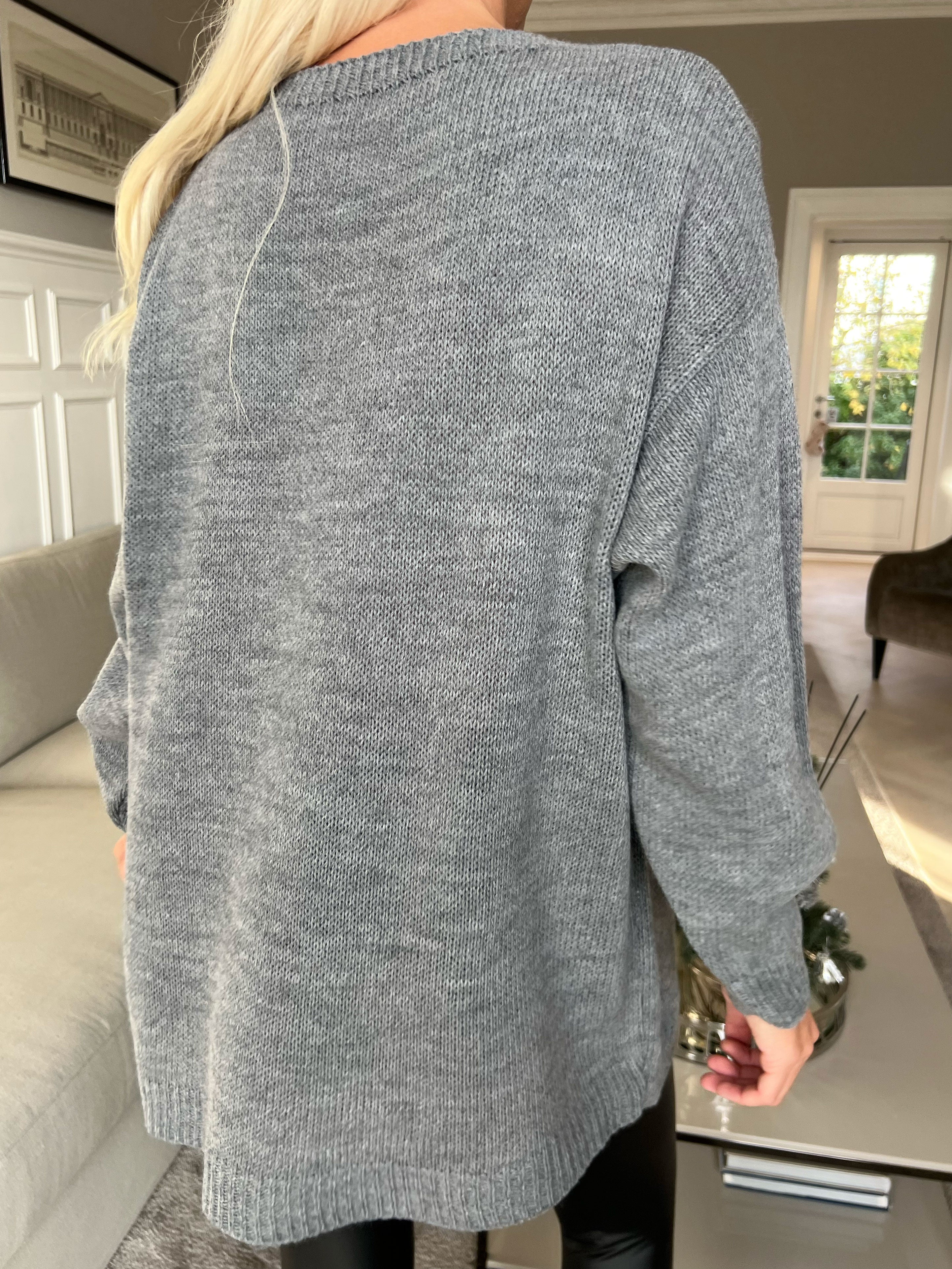 Mia - Stickad blus med fyrklövermotiv